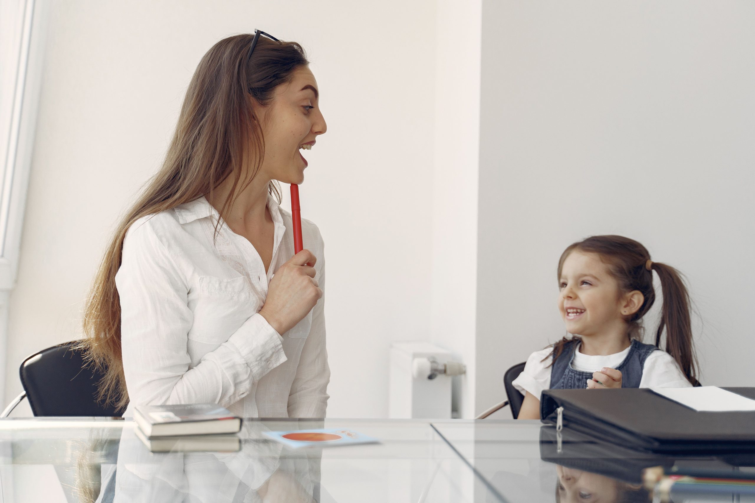 girl having fun in a speech therapy session